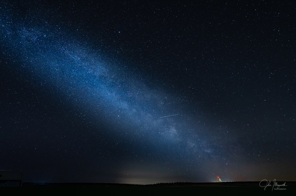 Image of the Milky Way stretched diagonally across the night sky